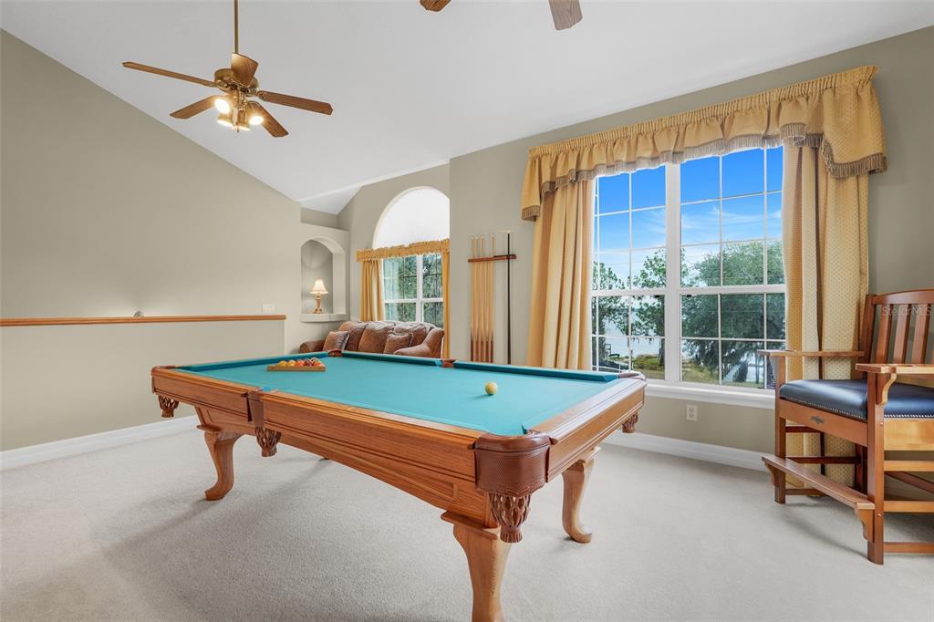 10336 Lake Louisa Road Clermont, FL 34711 - Photo 32 of 58 a room with pool table and windows