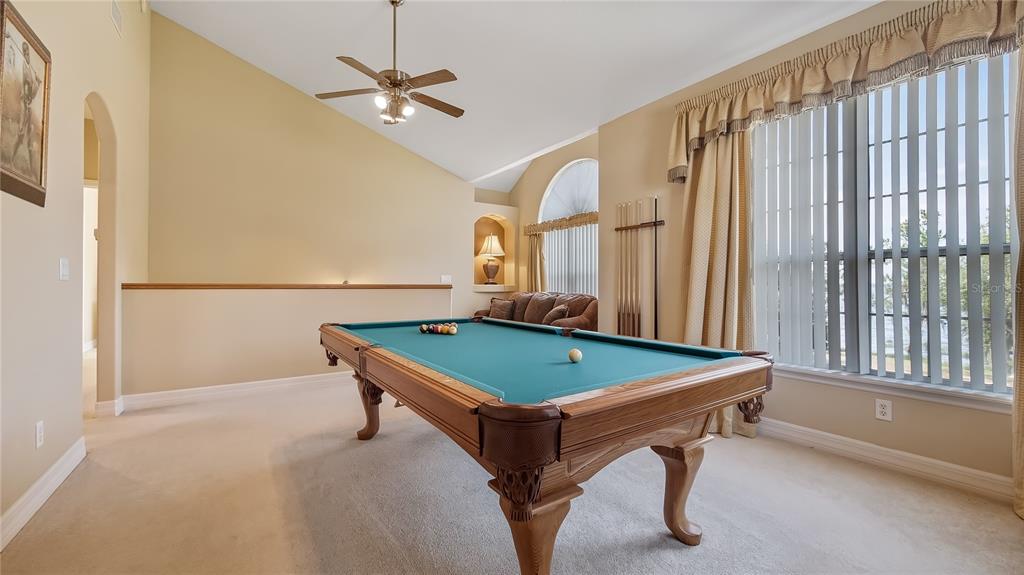 10336 Lake Louisa Road Clermont, FL 34711 - Photo 33 of 62 a room with pool table and windows