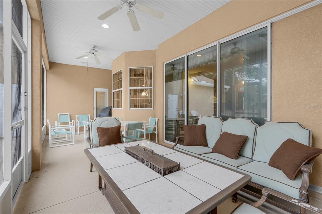 10336 Lake Louisa Road Clermont, FL 34711 - Photo 39 of 58 a living room with furniture and a large window