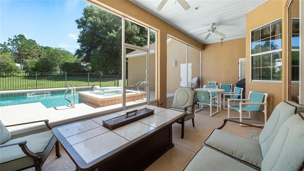 10336 Lake Louisa Road Clermont, FL 34711 - Photo 41 of 62 a view of a patio with a yard
