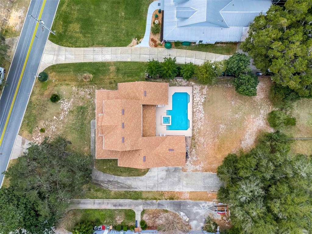 10336 Lake Louisa Road Clermont, FL 34711 - Photo 5 of 58 an aerial view of a house