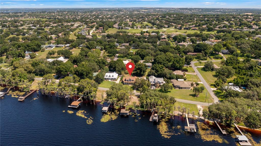 10336 Lake Louisa Road Clermont, FL 34711 - Photo 5 of 62 an aerial view of a city