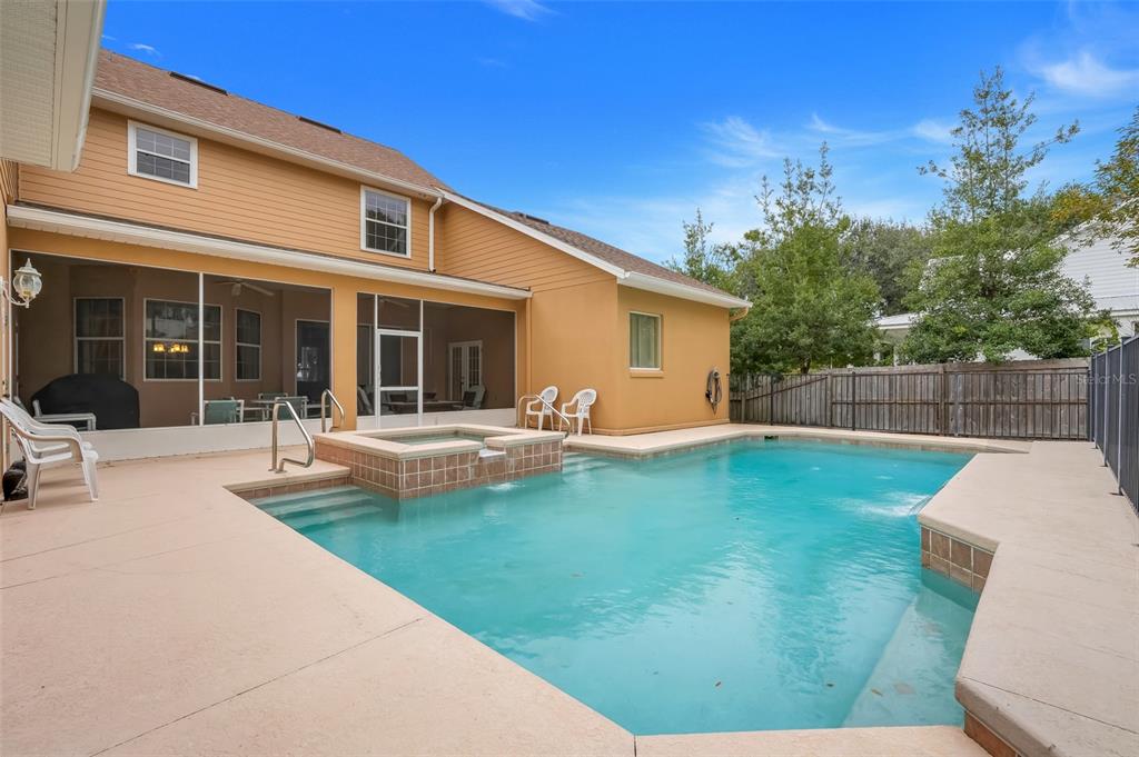 10336 Lake Louisa Road Clermont, FL 34711 - Photo 7 of 58 a view of a house with backyard and sitting area