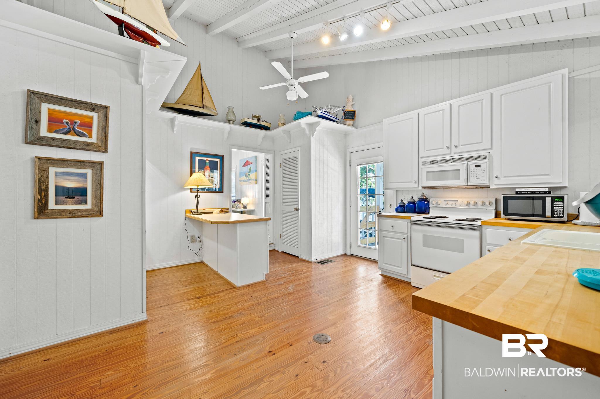 5424 Greentree Road Orange Beach, AL 36561 - Photo 10 of 33 Roomy Kitchen w/Wood floors