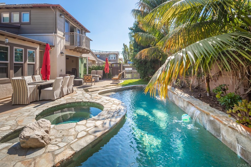 1905 Paxton Way Encinitas, CA 92024 - Photo 15 of 20 a swimming pool with outdoor seating and yard