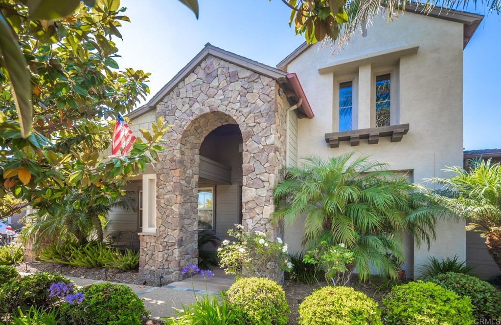 1905 Paxton Way Encinitas, CA 92024 - Photo 3 of 20 a front view of a house with a garden