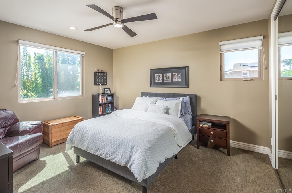 1905 Paxton Way Encinitas, CA 92024 - Photo 9 of 20 a bedroom with a bed and wooden floor