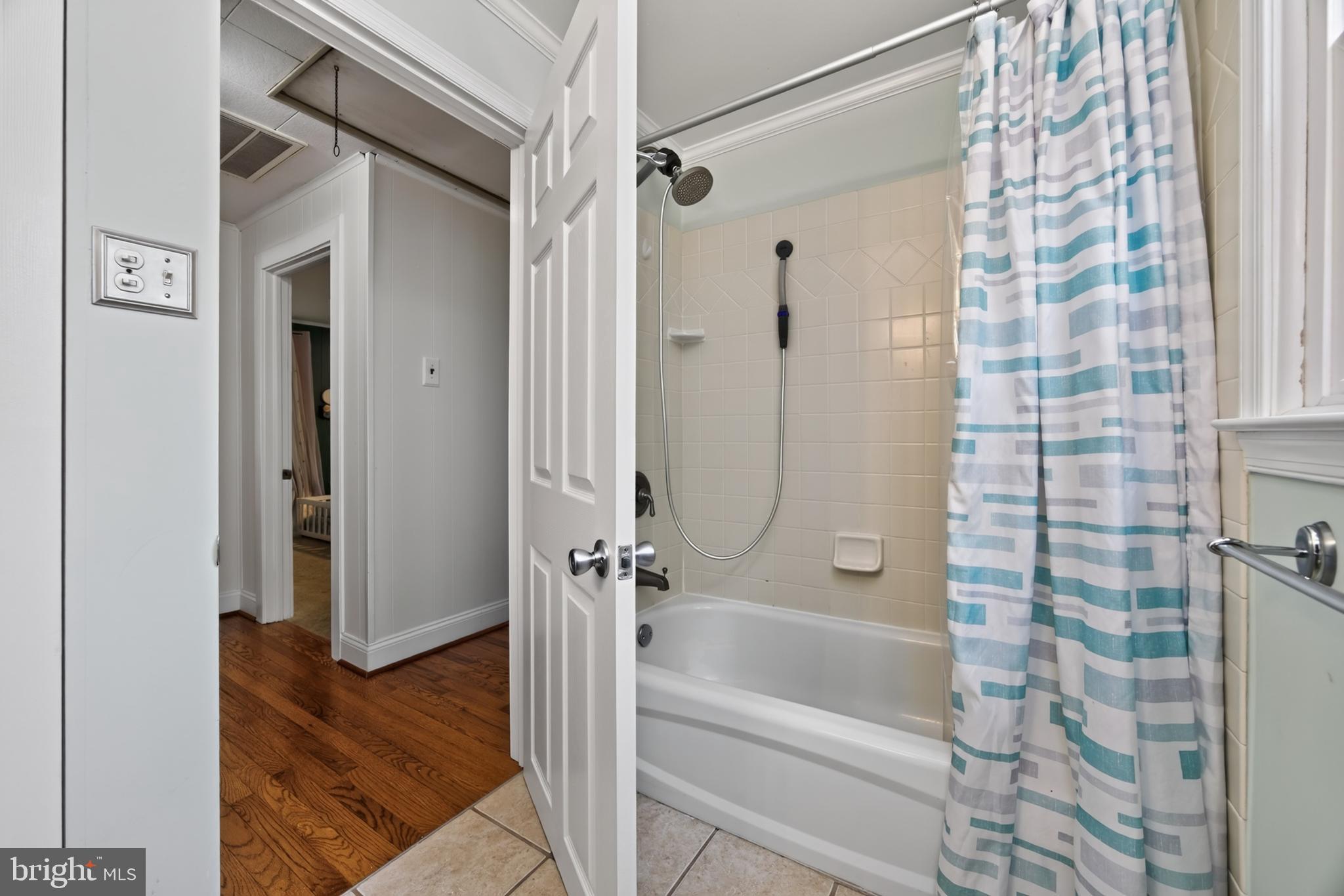 111 Fulmer Road Perkiomenville, PA 18074 - Photo 14 of 28 a bathroom with a bathtub and a shower