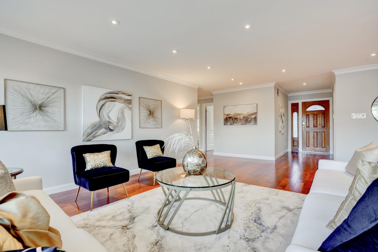 1112 Millbrae Avenue Millbrae, CA 94030 - Photo 12 of 100 a living room with furniture and wooden floor