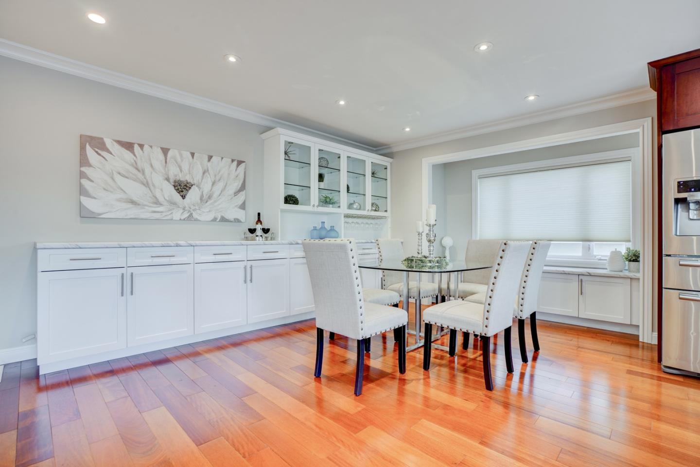 1112 Millbrae Avenue Millbrae, CA 94030 - Photo 17 of 100 a view of a dining room with furniture and wooden floor