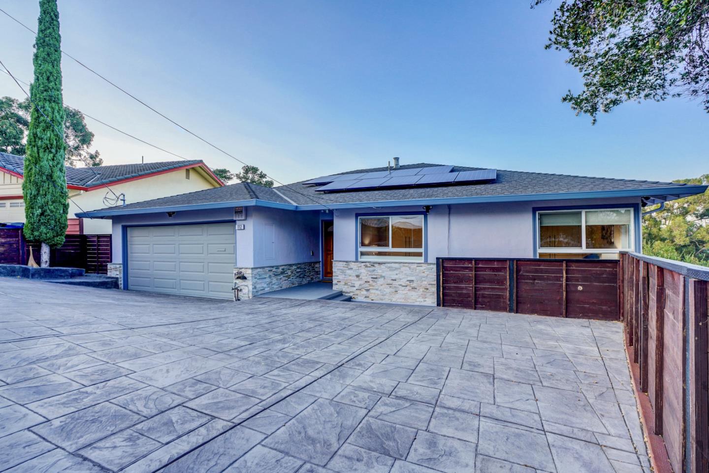 1112 Millbrae Avenue Millbrae, CA 94030 - Photo 3 of 100 a view of a house with a small yard and wooden fence