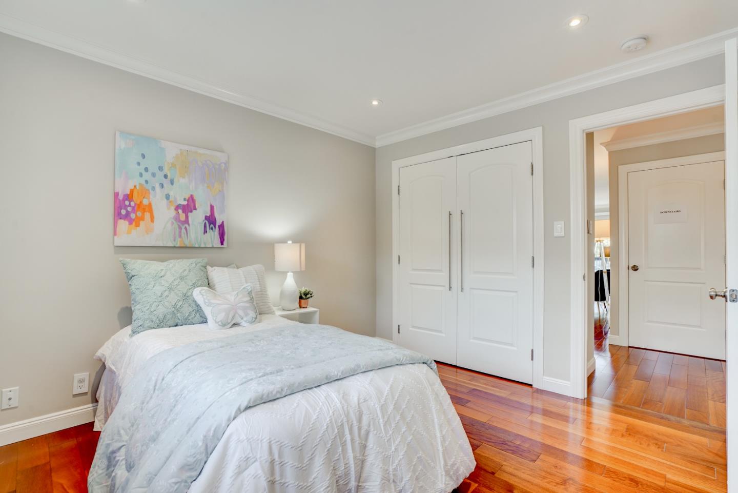 1112 Millbrae Avenue Millbrae, CA 94030 - Photo 31 of 100 a bed room with a bed and a painting on the wall