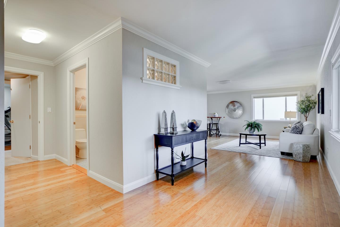 1112 Millbrae Avenue Millbrae, CA 94030 - Photo 45 of 100 a living room with furniture and a wooden floor