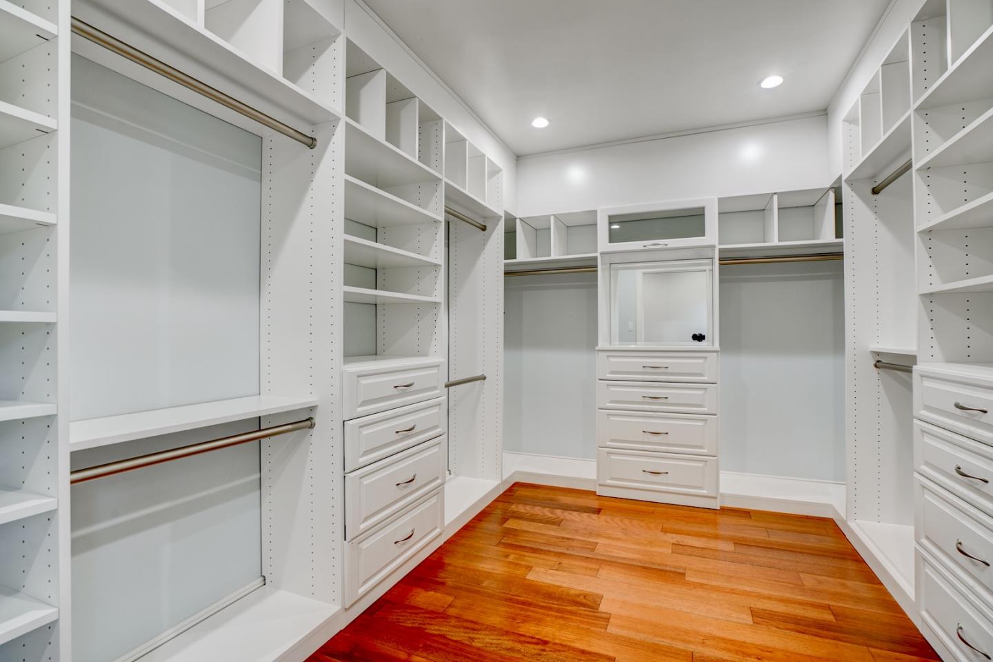 1112 Millbrae Avenue Millbrae, CA 94030 - Photo 60 of 100 a view of walk in closet with clothes and shoes