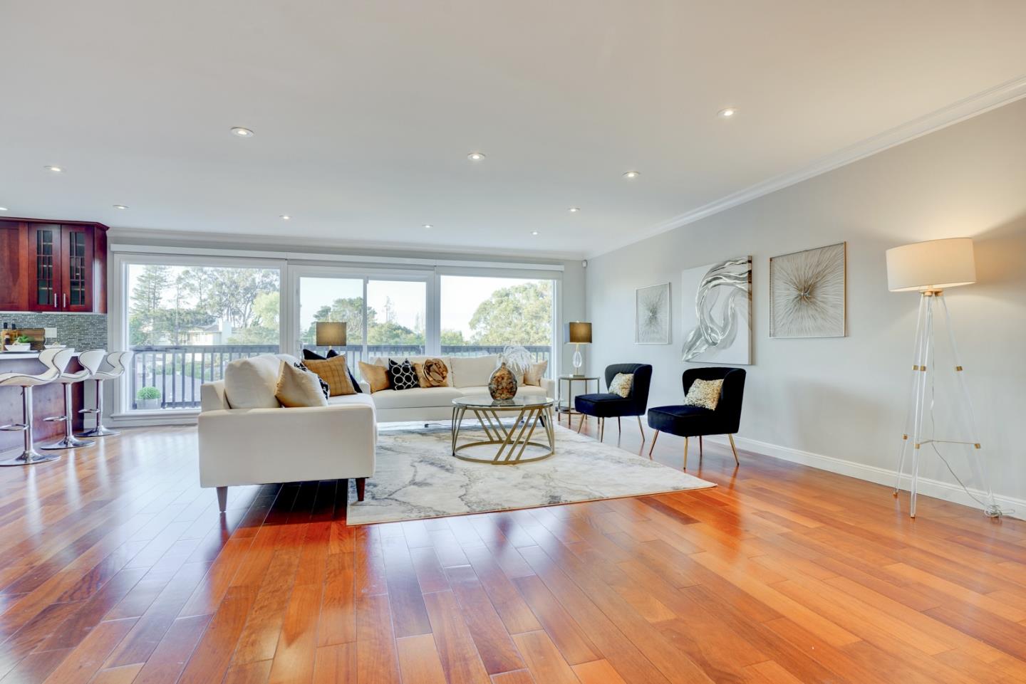 1112 Millbrae Avenue Millbrae, CA 94030 - Photo 6 of 100 a living room with fireplace furniture and a wooden floor