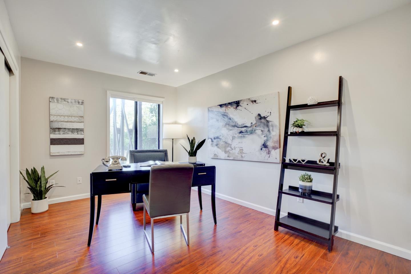 1112 Millbrae Avenue Millbrae, CA 94030 - Photo 74 of 100 a view of a workspace with furniture and wooden floor