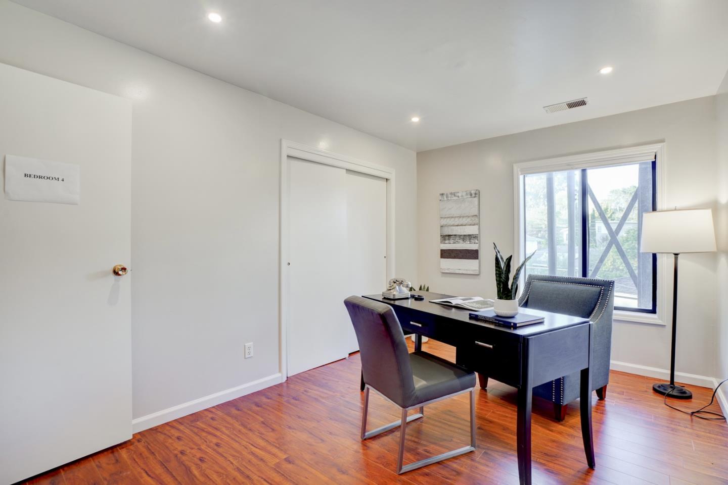 1112 Millbrae Avenue Millbrae, CA 94030 - Photo 75 of 100 a view of a workspace with furniture and a window