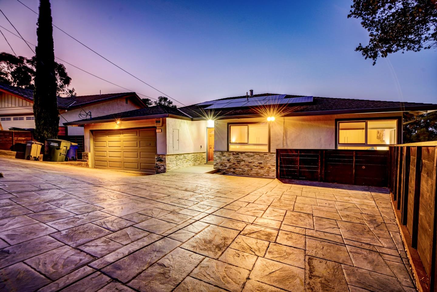 1112 Millbrae Avenue Millbrae, CA 94030 - Photo 100 of 100 a view of an empty room with a fireplace and a window