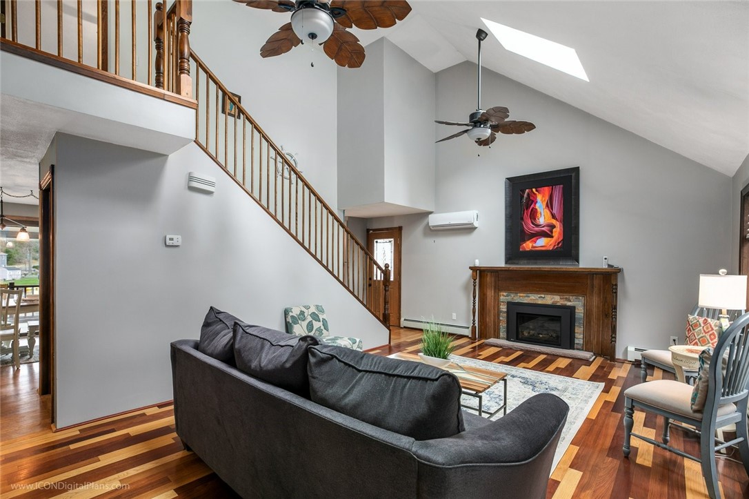 79 Lake Drive Glocester, RI 02814 - Photo 12 of 34 Gas fireplace has a remote control