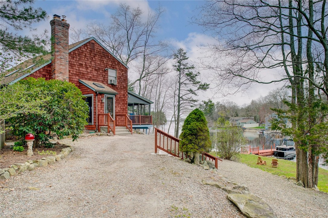 79 Lake Drive Glocester, RI 02814 - Photo 6 of 34 Side entrance with more parking