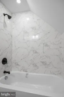 a bathroom with a bathtub