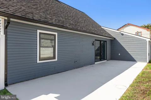 a view of backyard of a house