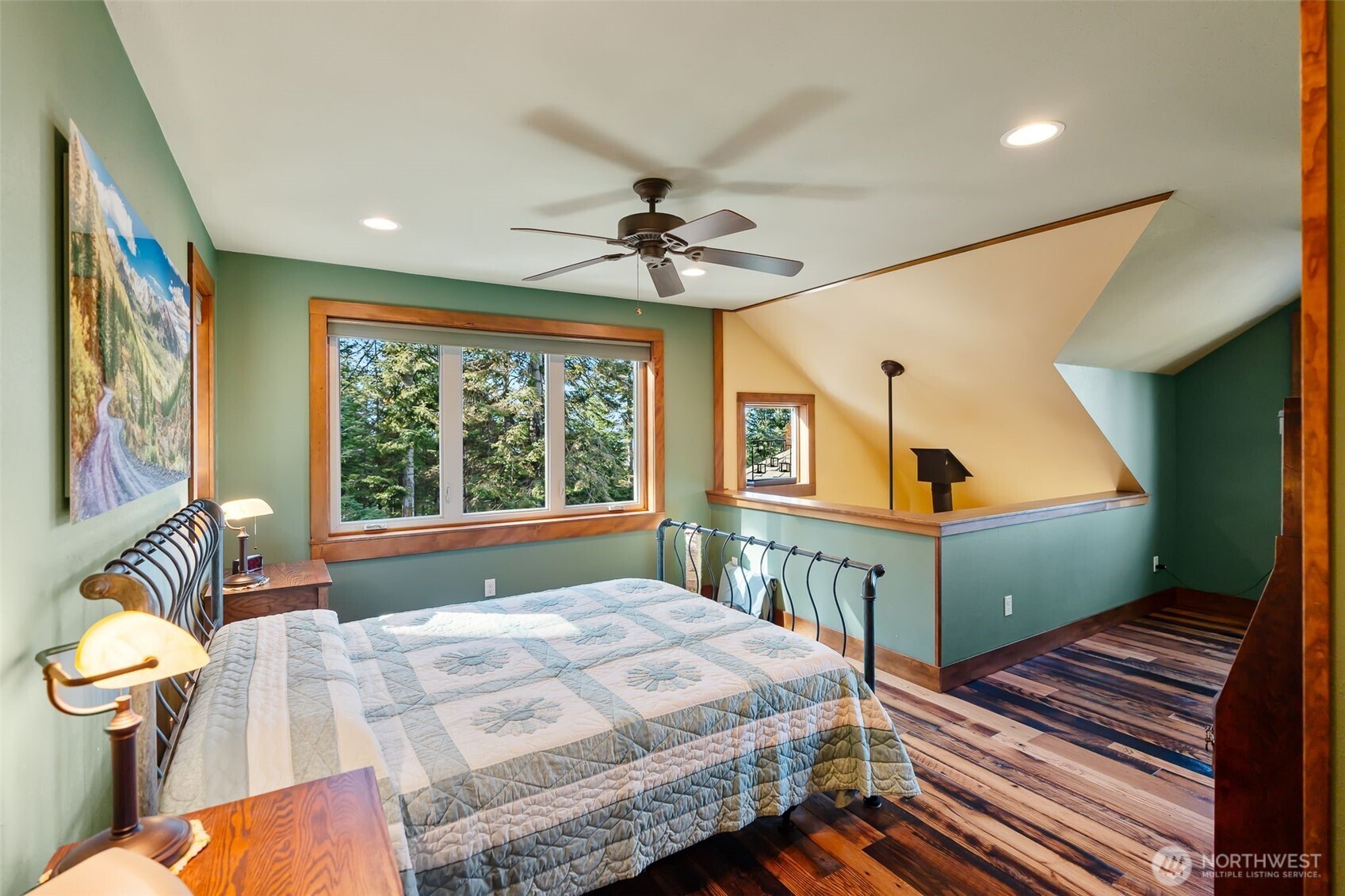 824 Huntrick Drive Cle Elum, WA 98922 - Photo 20 of 38 a bedroom with a bed and a chandelier