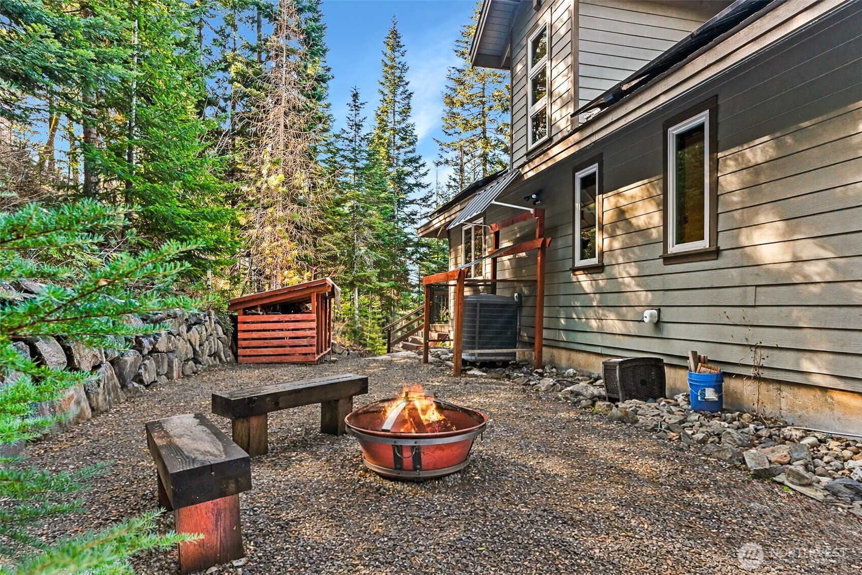 824 Huntrick Drive Cle Elum, WA 98922 - Photo 3 of 38 a backyard of a house with a table and chairs