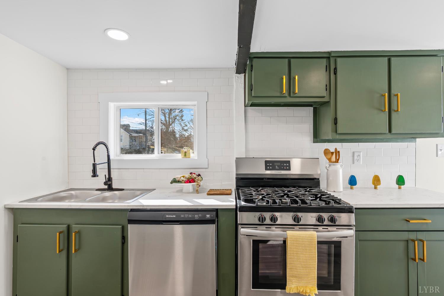 2961 Triangle Place Lynchburg, VA 24501 - Photo 15 of 26 a kitchen with a sink a stove and cabinets
