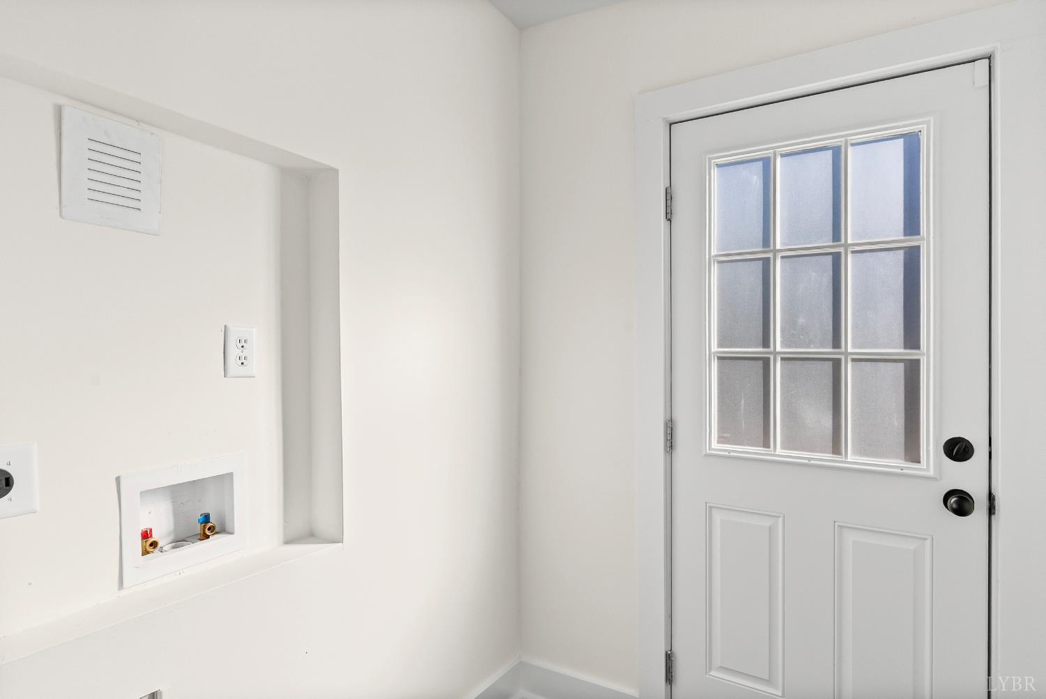 2961 Triangle Place Lynchburg, VA 24501 - Photo 17 of 26 a white cabinet sitting in a bathroom next to a window