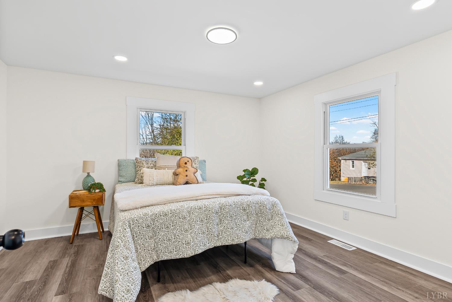 2961 Triangle Place Lynchburg, VA 24501 - Photo 6 of 26 a bedroom with a bed and a table in it