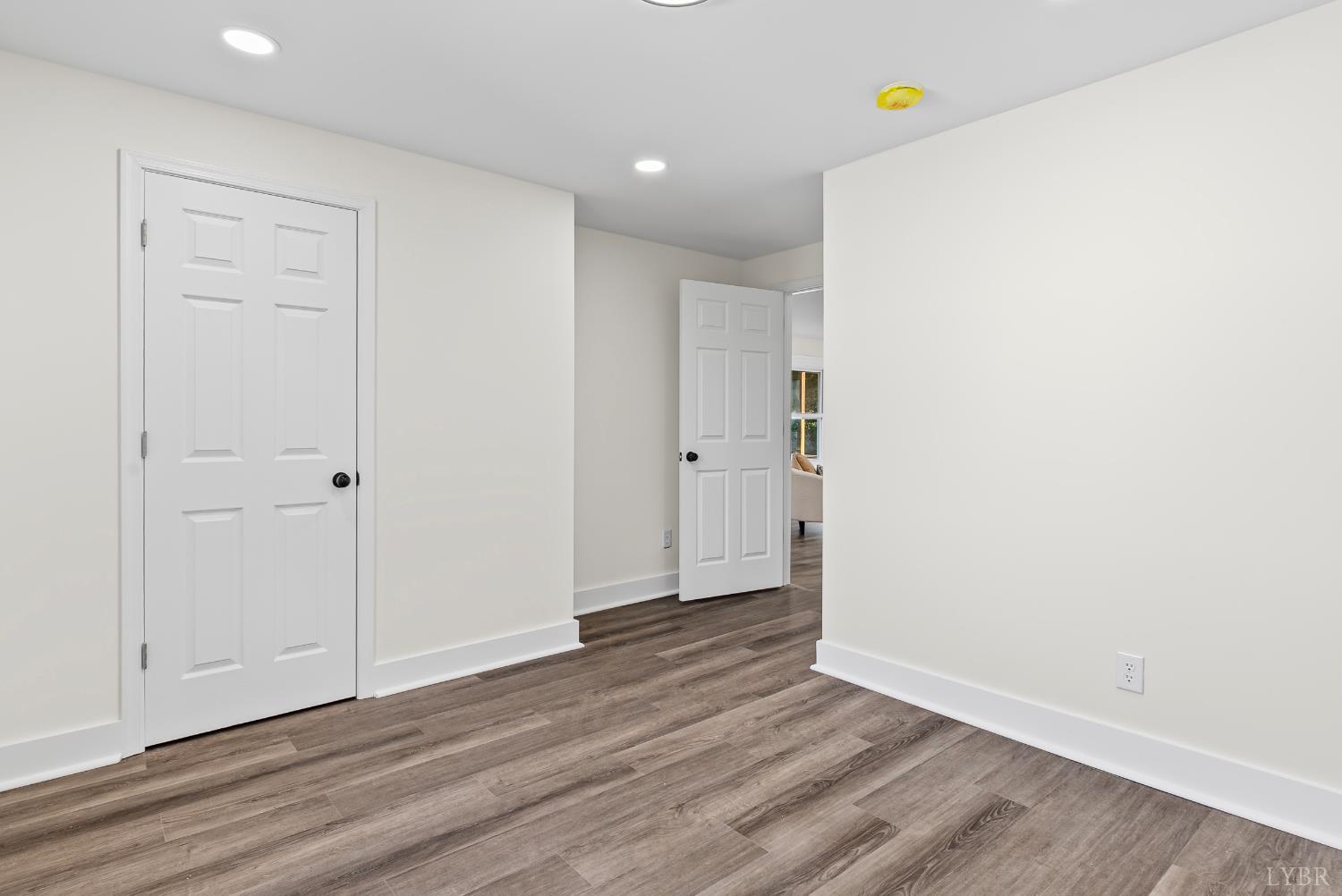 2961 Triangle Place Lynchburg, VA 24501 - Photo 9 of 26 a view of an empty room with wooden floor