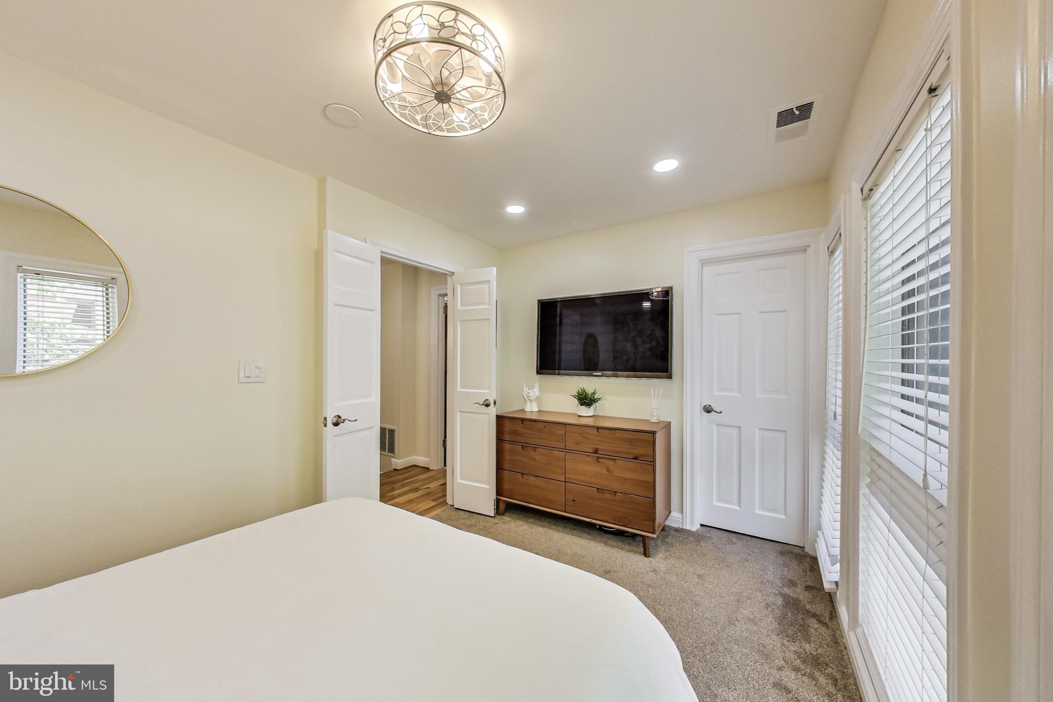 4814 Hampden Lane, Unit R2 Bethesda, MD 20814 - Photo 14 of 31 Walk In closet with Elfa system