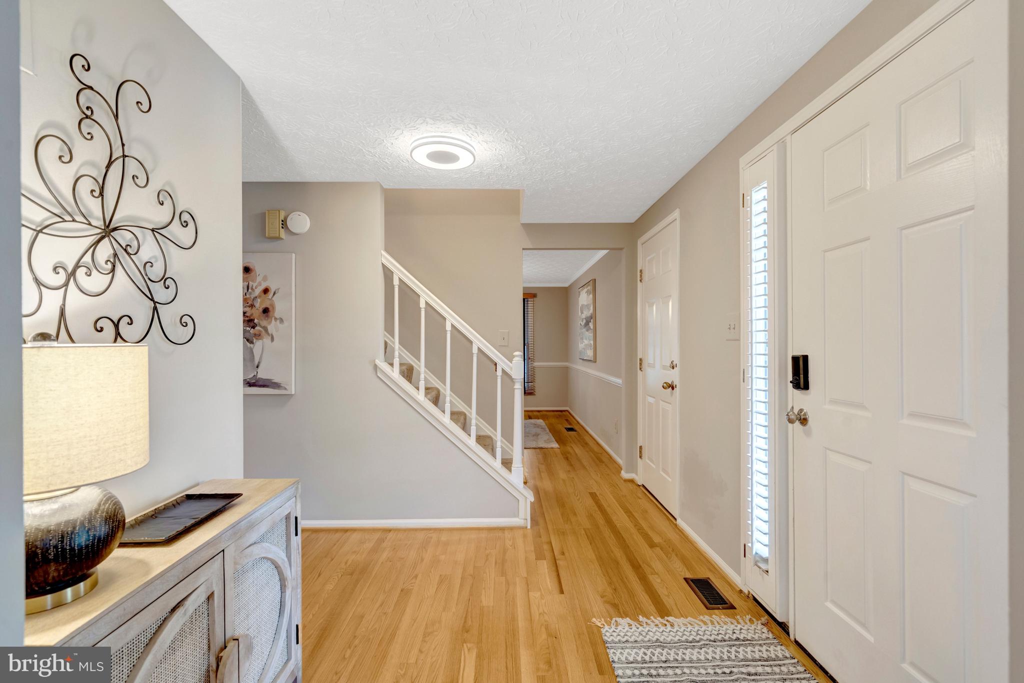 7809 Roundabout Way Springfield, VA 22153 - Photo 6 of 83 Foyer with a warm welcome