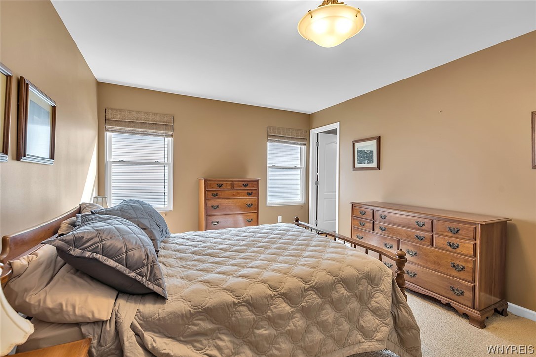 6260 Eckhardt Road, Unit 4 Hamburg, NY 14085 - Photo 23 of 50 Primary Bedroom