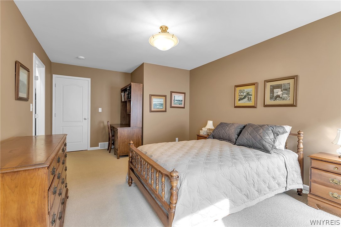 6260 Eckhardt Road, Unit 4 Hamburg, NY 14085 - Photo 24 of 50 Primary Bedroom