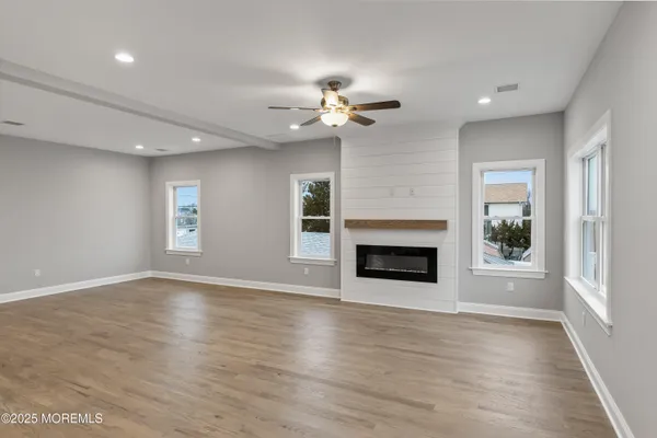 a view of a room window and fireplace