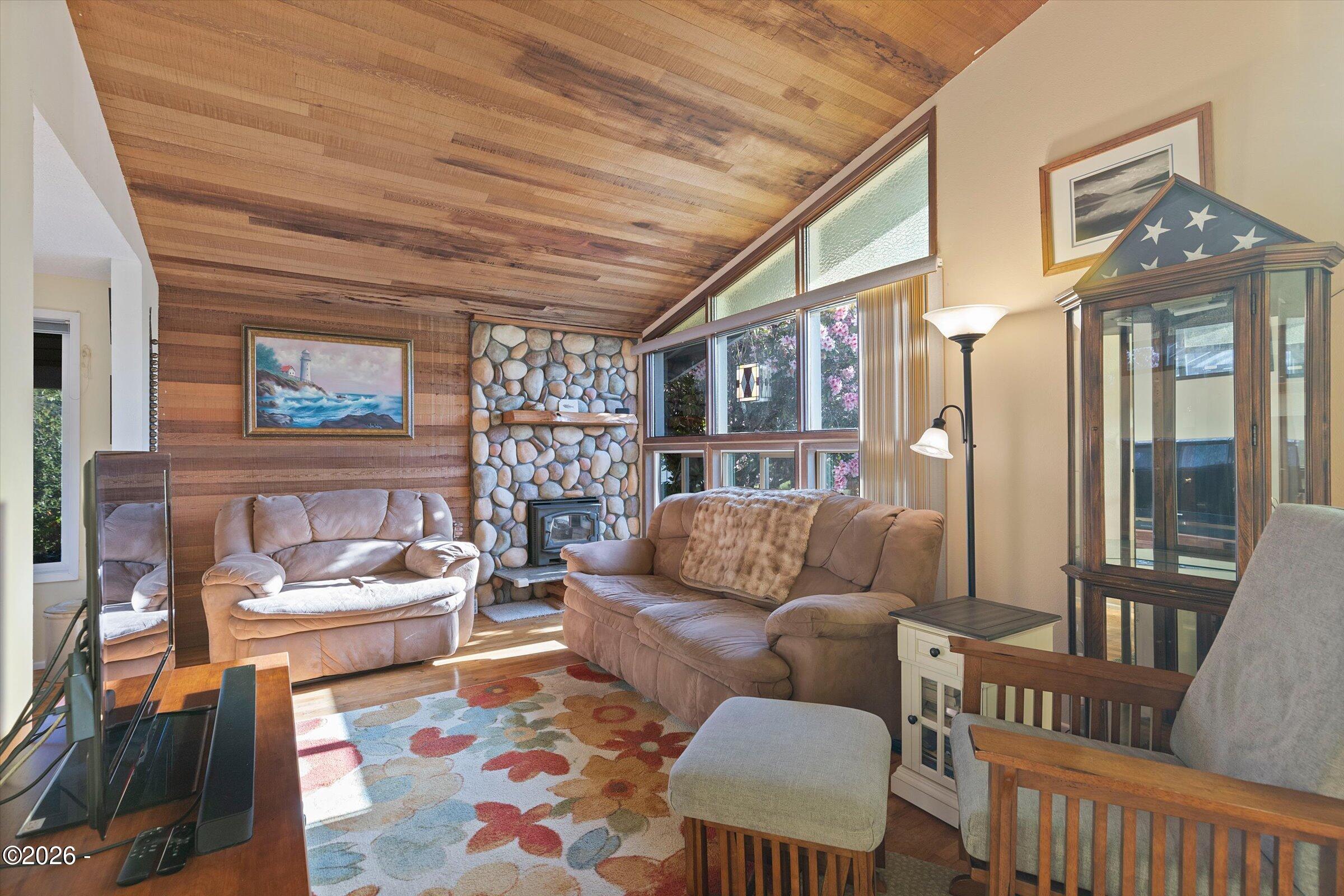 1318 Southeast Maple Street Toledo, OR 97391 - Photo 4 of 54 Living room with cozy Lopi wood insert