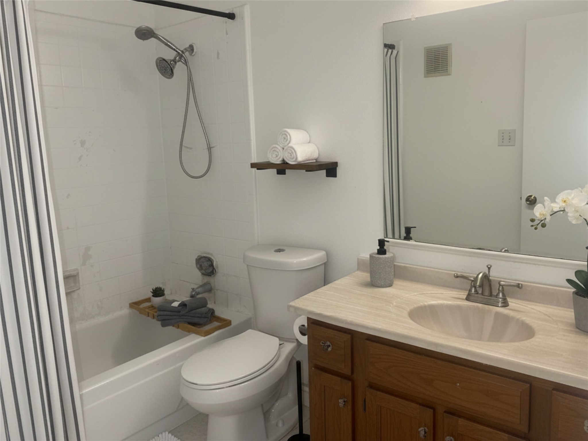 6500 Sands Point Drive, Unit 201 Houston, TX 77074 - Photo 6 of 10 a bathroom with a granite countertop sink toilet and shower