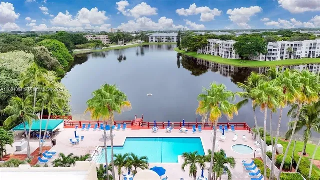 a view of a city and swimming pool