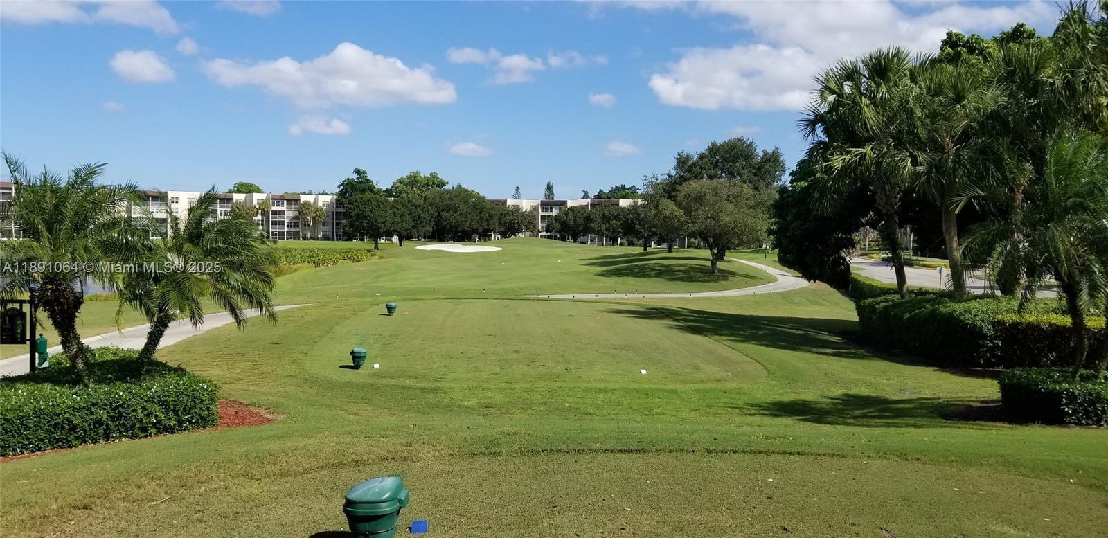 9430 Live Oak Place, Unit 404 Davie, FL 33324 - Photo 26 of 28 a view of a golf course