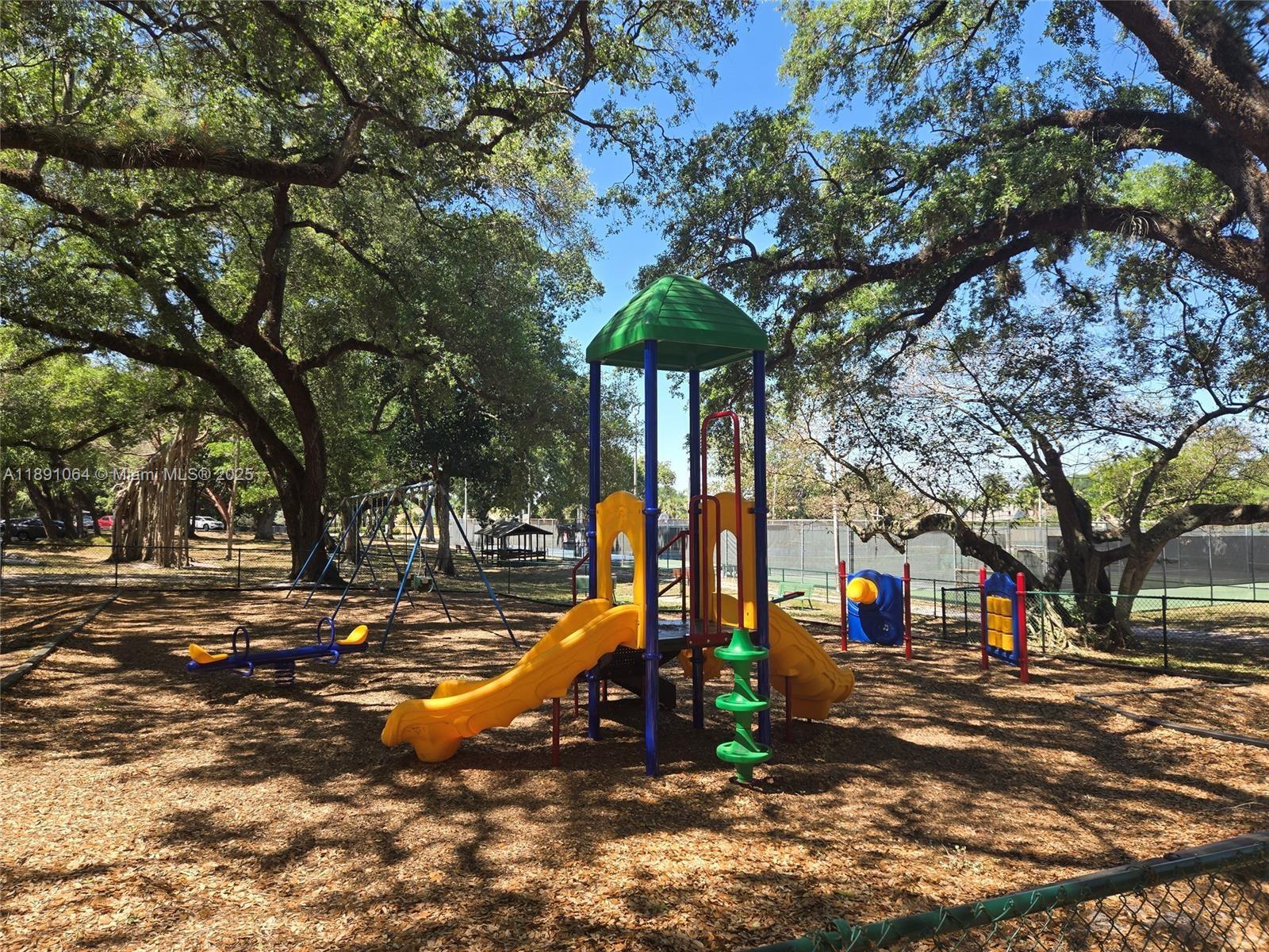 9430 Live Oak Place, Unit 404 Davie, FL 33324 - Photo 28 of 28 a view of a park with tree s