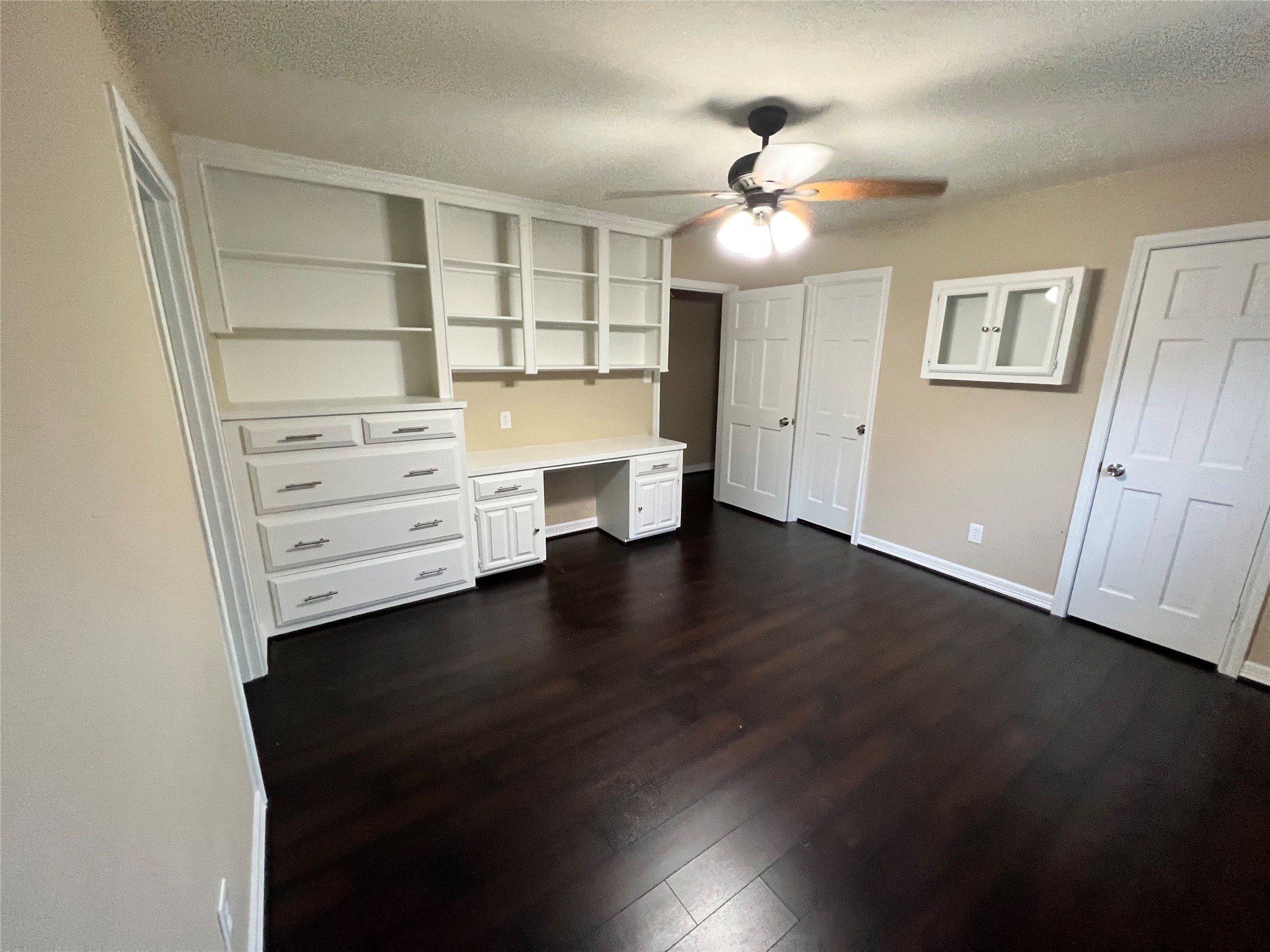 18240 Fenske Road Cypress, TX 77433 - Photo 15 of 20 a view of an empty room with a window and wooden floor
