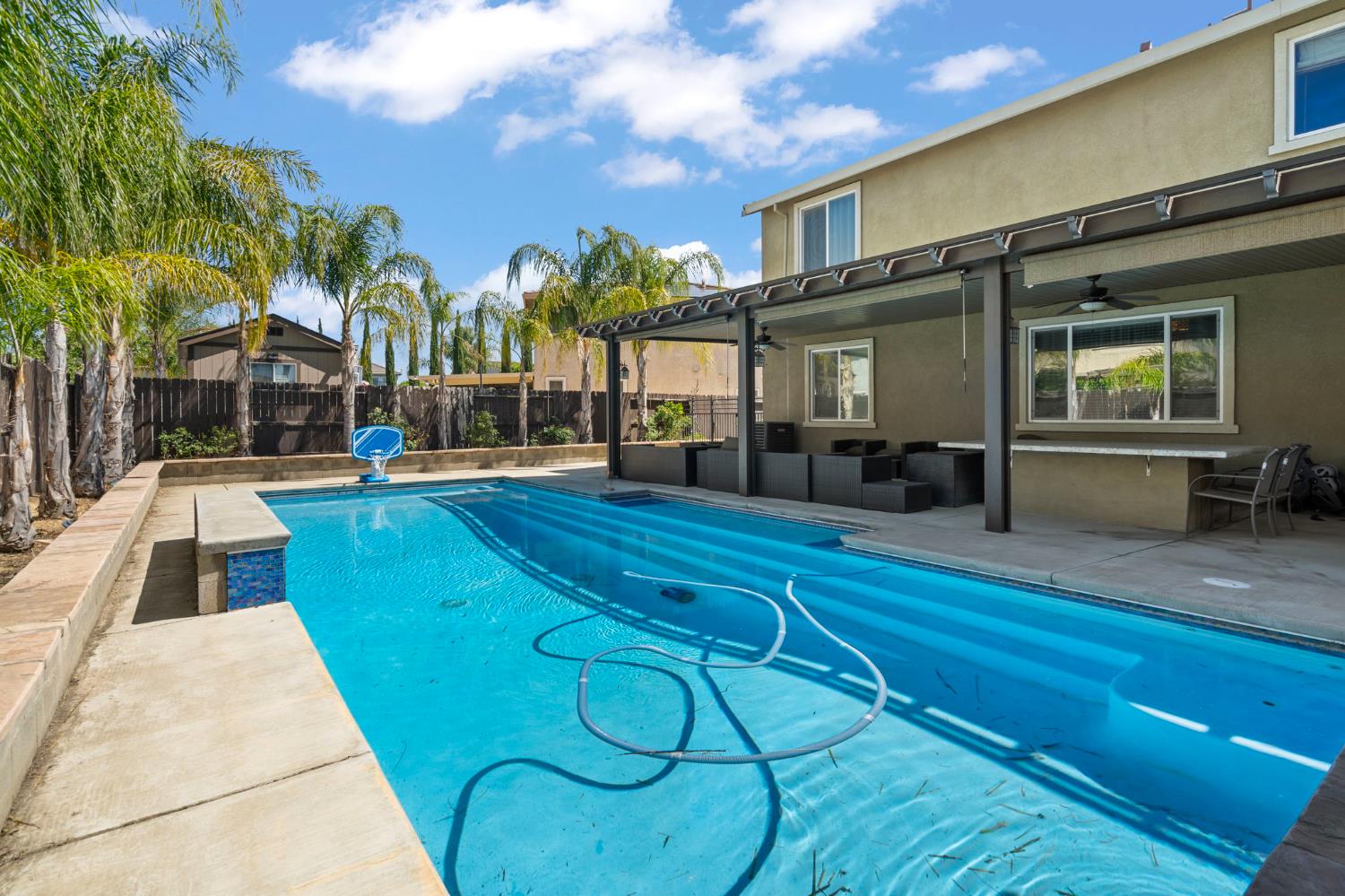 2317 Mathar Drive Manteca, CA 95337 - Photo 45 of 48 a view of a house with a swimming pool