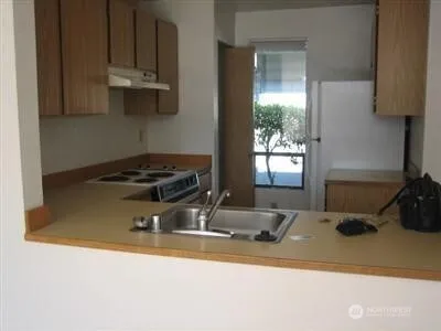 a view of a utility room with washer and dryer