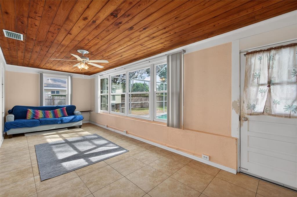 1739 Turner Street Clearwater, FL 33756 - Photo 27 of 72 a living room with hard wood floor and a large window