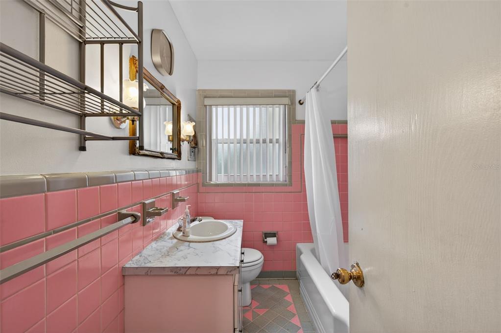 1739 Turner Street Clearwater, FL 33756 - Photo 33 of 72 a bathroom with a sink toilet and shower