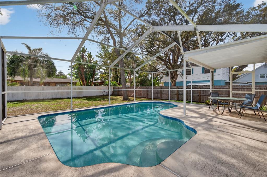 1739 Turner Street Clearwater, FL 33756 - Photo 46 of 72 a view of a backyard with swimming pool