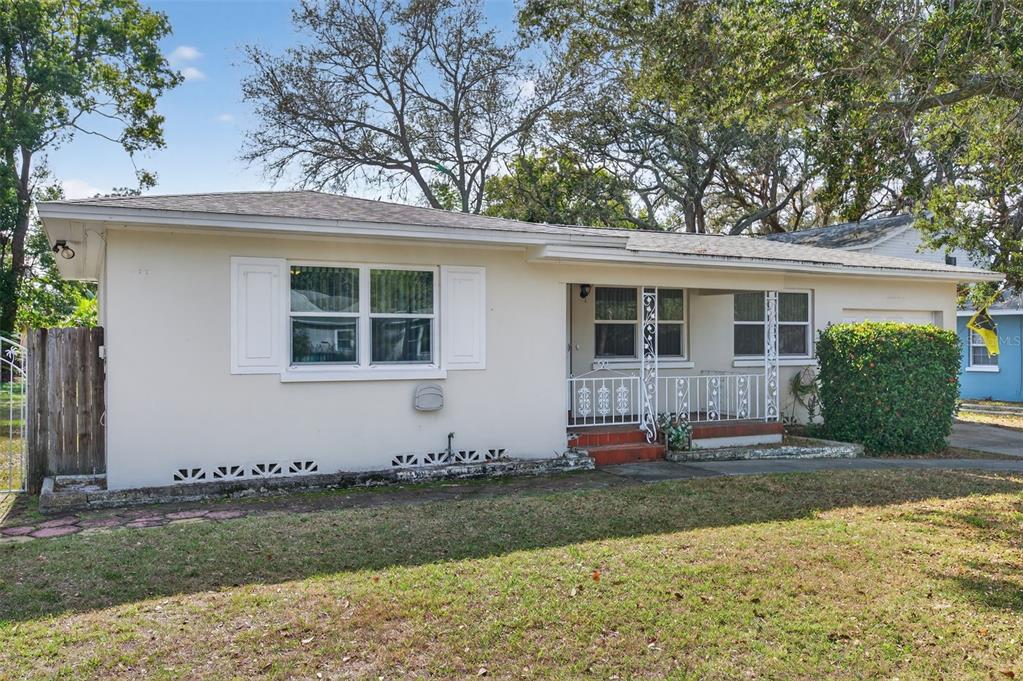 1739 Turner Street Clearwater, FL 33756 - Photo 5 of 72 a front view of a house with a yard and garage