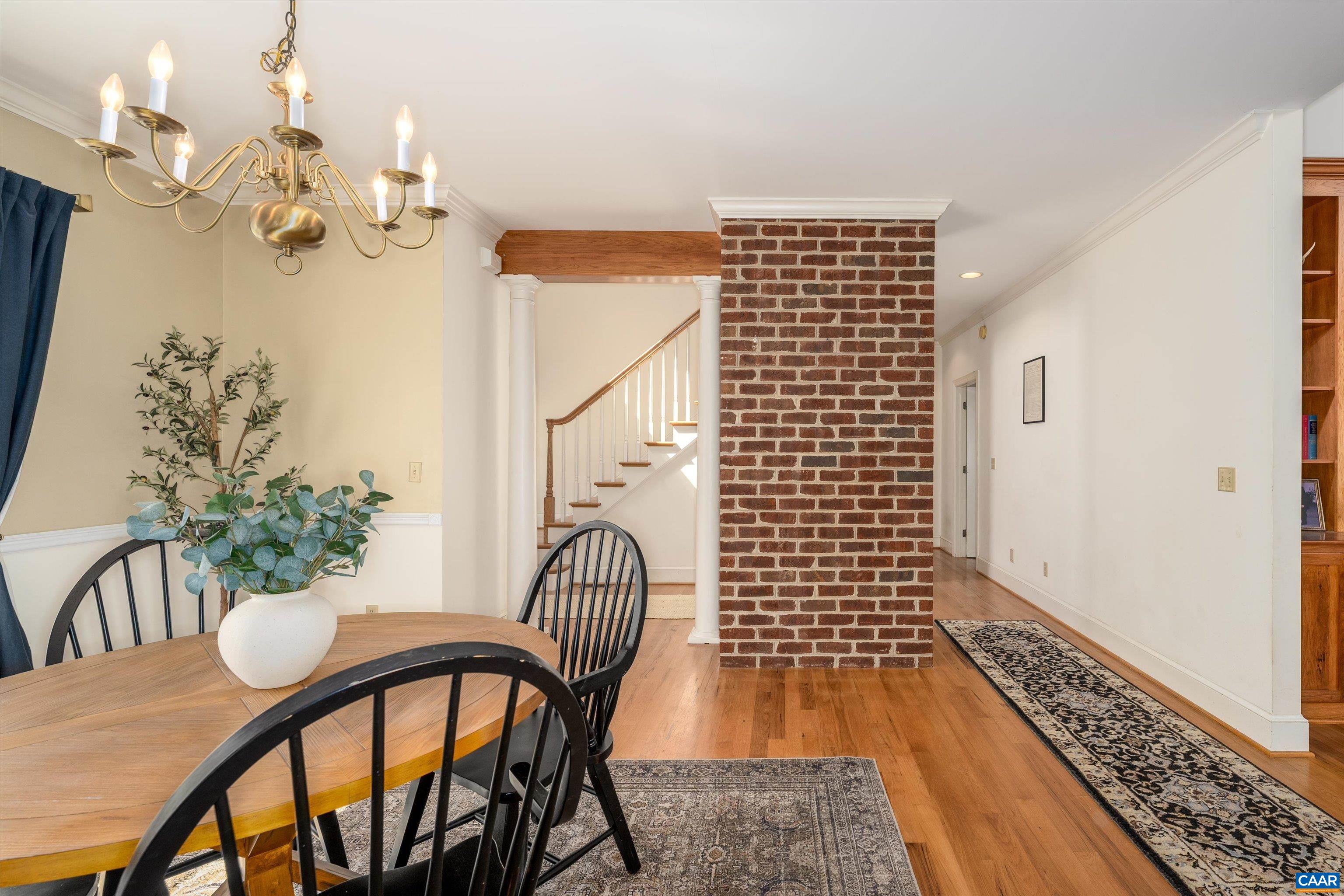 4444 Woods Edge Road Troy, VA 22974 - Photo 12 of 74 a view of a dining room with furniture and wooden floor